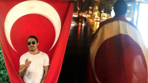 Nusret Türk bayrağıyla New York sokaklarında