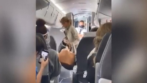ABD’de maske takmayı reddeden kadın yolcu uçaktan indirildi