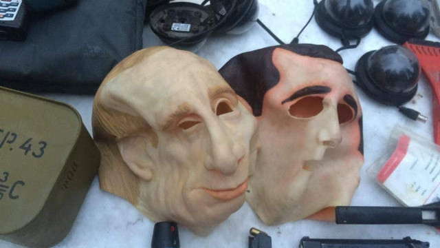 Putin maskesi takıp soygun yaptılar