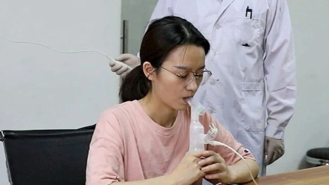 Çin'de uygulanmaya başlandı! Pipetle solunan korona aşısı yaptılar